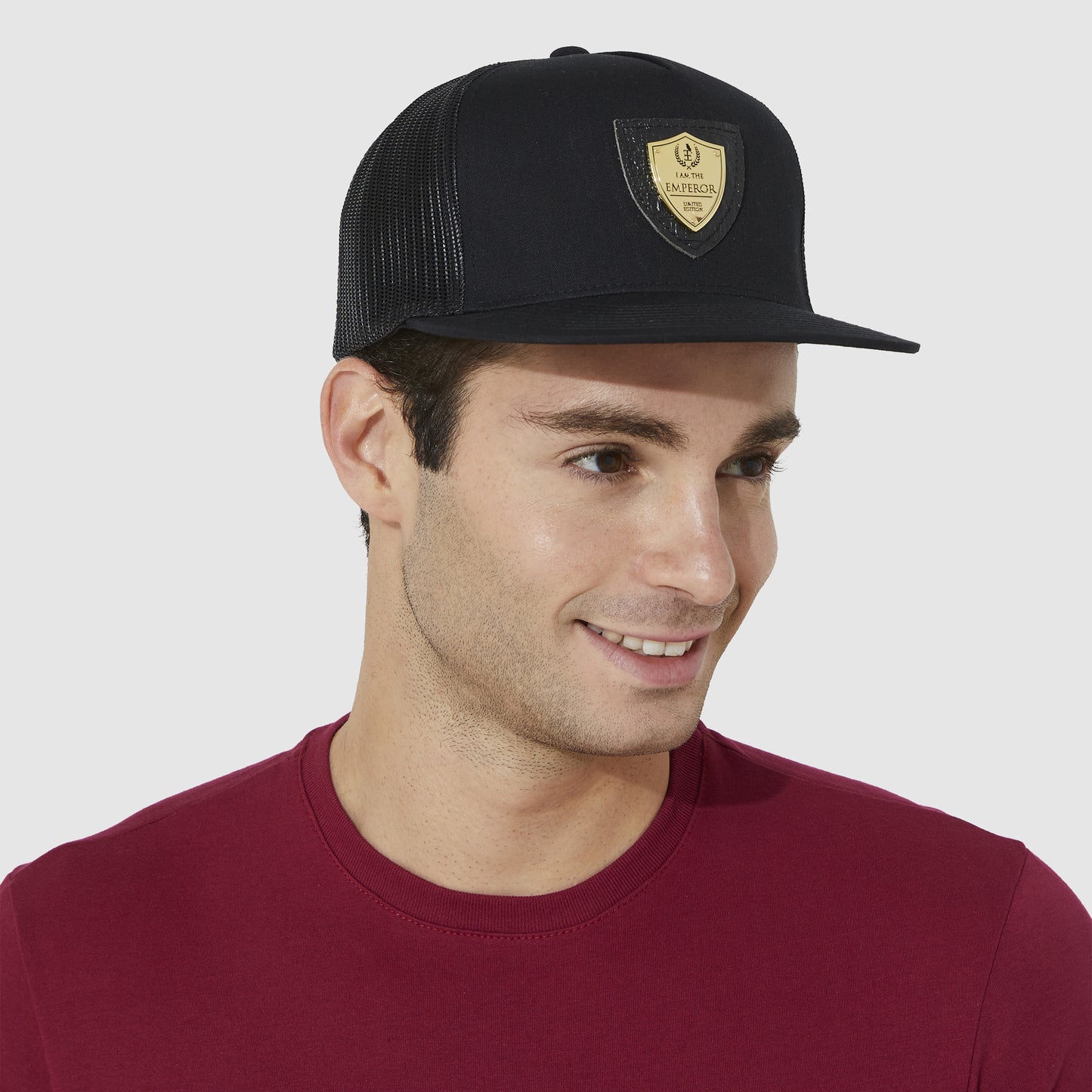 GOLD LOGO TRUCKER HAT