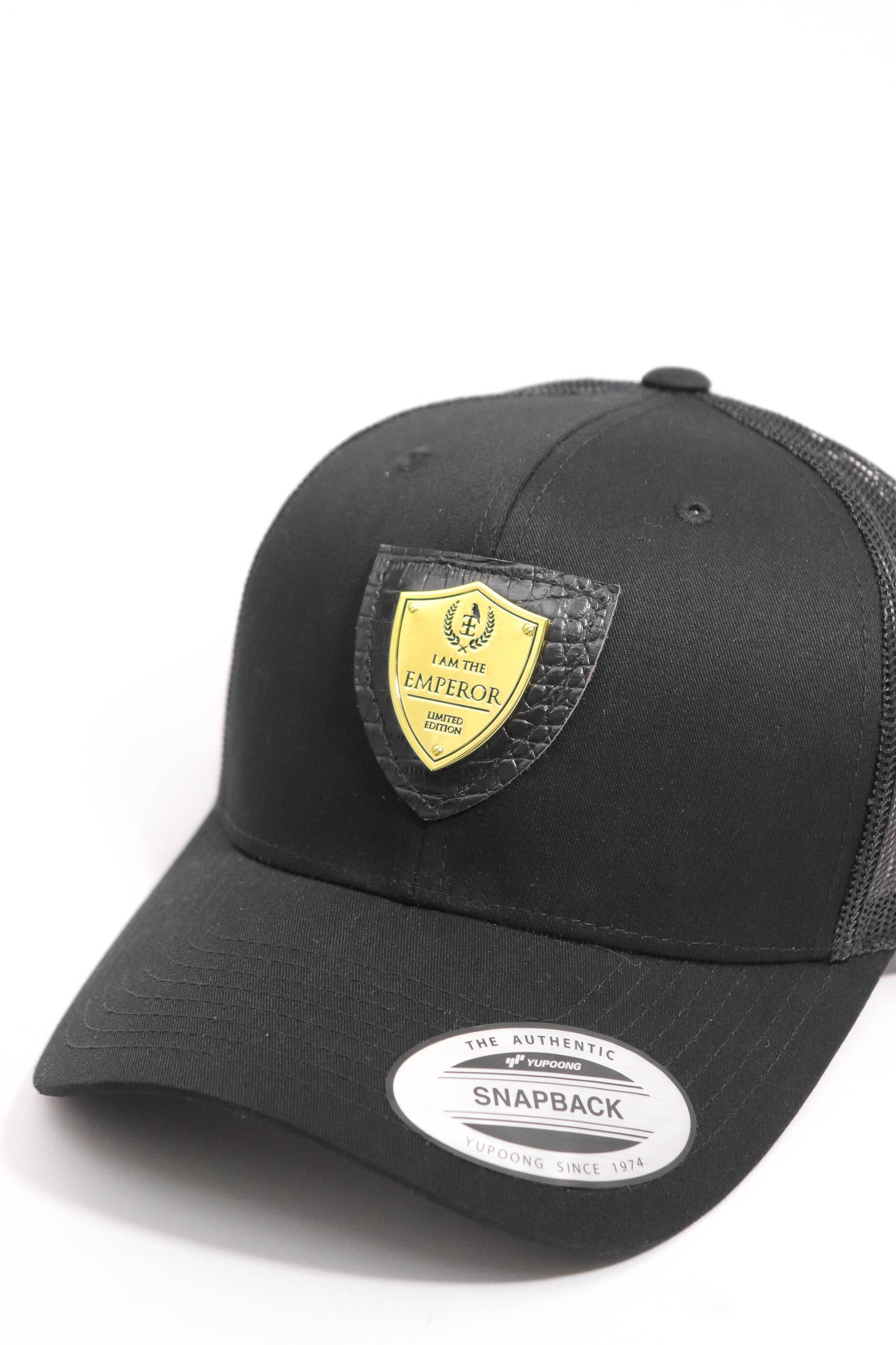 GOLD LOGO TRUCKER HAT